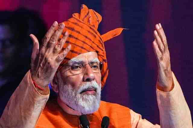 Prime Minister Narendra Modi addresses a gathering during the Dussehra celebrations in Delhi