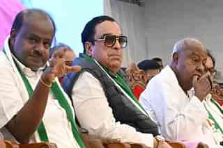 JD(S) Supremo H D Deve Gowda with former chief minister H D Kumaraswamy and former party state president C M Ibrahim.