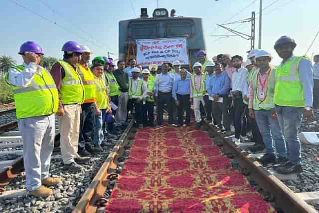 Officials of DFCC at the electric loco trial on Eastern-DFC.