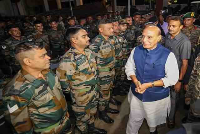 Rajnath Singh interacting with security personnel at Tezpur military station. (Pic via X @rajnathsingh)