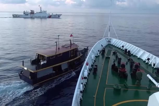 Chinese coast guard vessel preventing a Phipippines re-supply mission to Sierra Madre. (Image via Reuters)