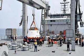 Recovered crew module of Gaganyaan first test flight onboard INS Shakti. 