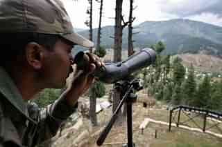 An Indian Army soldier keeps a close watch on line of control (LoC).