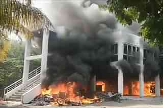 Still from ANI video of NCP MLA's house on fire