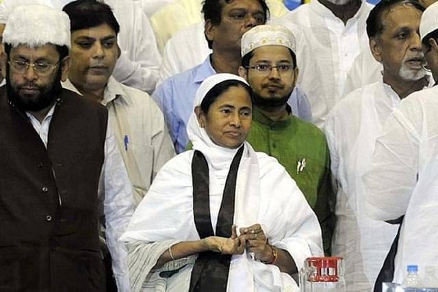 Chief Minister Mamata Banerjee with Muslim community leaders.