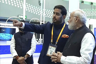Reliance Jio Infocomm chairman Akash Ambani showcasing JioSpaceFiber and other indigenous technologies to PM Narendra Modi at the India Mobile Congress on 27 October 2023
