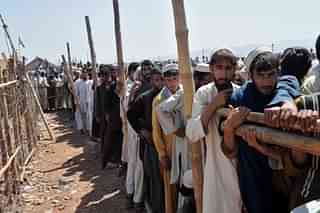 Afghan refugees forced out of Pakistan.