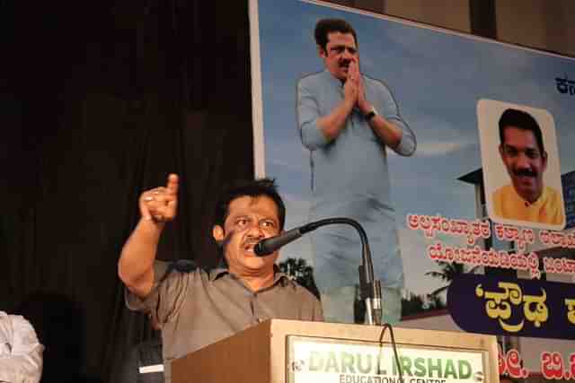 Minister for Housing, Waqf and Minority affairs B Z Zameer Ahmed Khan addressing a gathering in Puttur. 