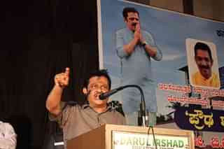 Minister for Housing, Waqf and Minority affairs B Z Zameer Ahmed Khan addressing a gathering in Puttur. 