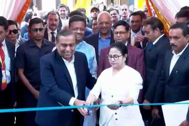 Mukesh Ambani with Mamata Banerjee