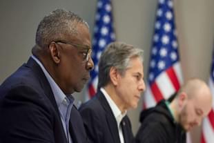 Secretary of Defence Lloyd Austin and Secretary of State Antony Blinken attend a meeting.