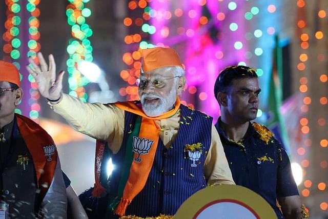 Prime Minister Narendra Modi during a road show in Indore. 