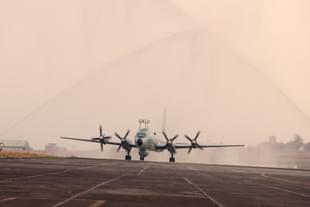 IL-38 Sea Dragon aircraft undergoing water salute after its decommissioning. (Pic via X @indiannavy)