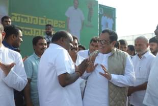 JD(S) leader HD Kumaraswamy shares a laugh with CM Ibrahim.