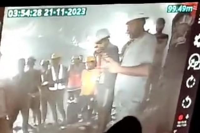 Trapped workers seen through camera