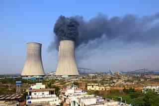 Smoke billows out of one of the cooling towers after a fire broke out at a thermal power plant in Chanda of Maharashtra’s Chandrapur district.