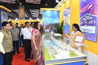 CRB Jaya Varma Sinha inspecting the bullet train project exhibit.