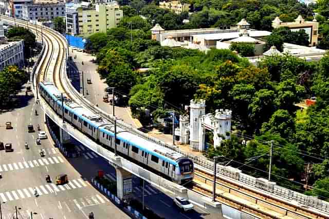 The redesign aims to reduce construction expenses by lowering the height of the elevated structure. 