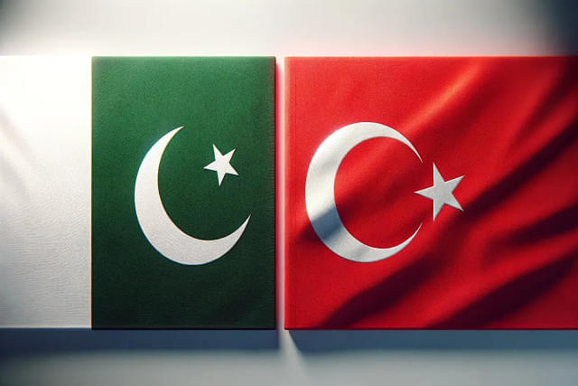 Pakistan and Turkish flag side by side.