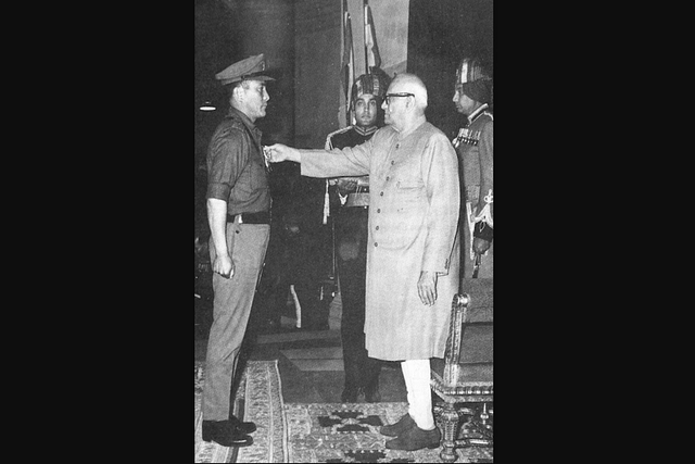 Colonel Chewan Rinchen receiving his Mahavir Chakra (MVC) from President of India.