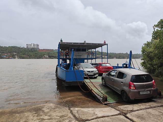 Loading the vehicles onto the ferry at Divar terminal.