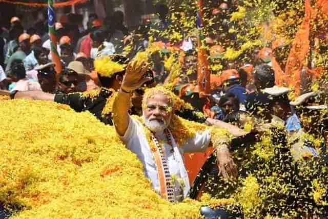 PM Modi in a roadshow in Mandya (Twitter)