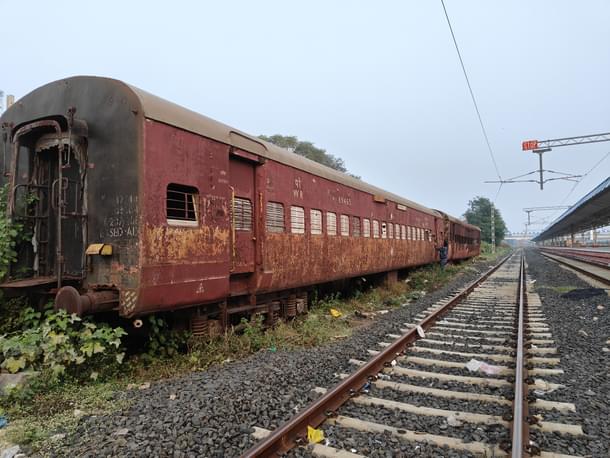 Remains of the S/6 and S/7 bogeys parked near the Godhra railway station (Sharan Setty/Swarajya)