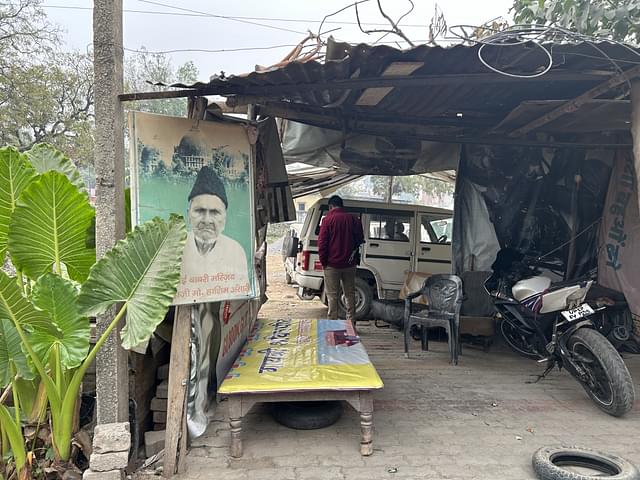 The tyre repair shop in front of Ansari's house