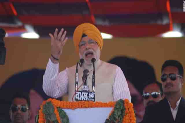 Prime Minister Narendra Modi, addressing a event.