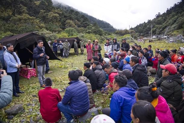 Chief Minister Pema Khandu speaking to residents of Mago.