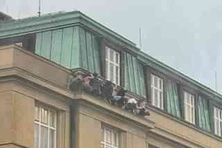 Students hiding on ledge during mass shooting at Charles University in Prague.