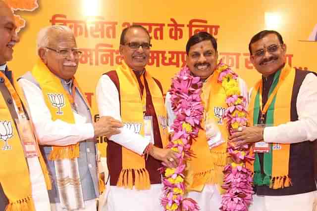 Madhya Pradesh Chief Minister-elect Dr Mohan Yadav with former chief minister Shivraj Singh Chouhan