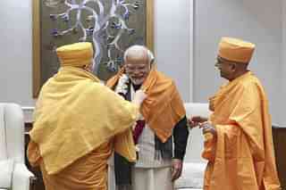 PM Modi accepting the invitation from BAPS.