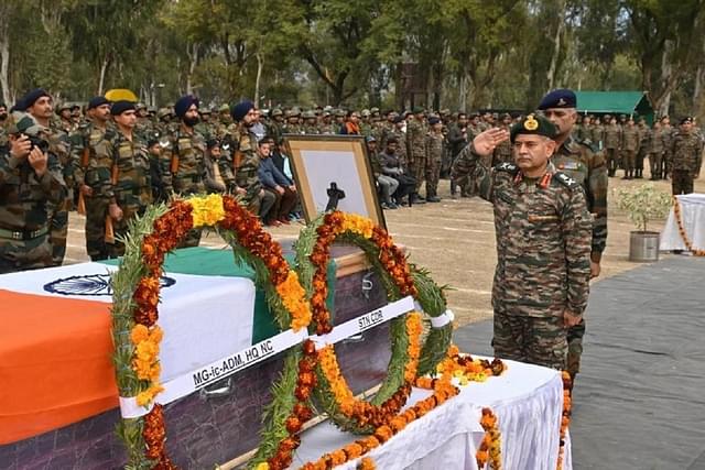 Lt. Gen. Upendra Dwivedi, Army Commander-Northern Command, pays homage to soldiers who were killed in a terrorist ambush in December 2023 in the Rajouri-Poonch sector.