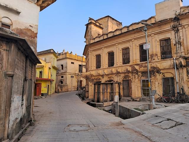 Wandering through the streets of the ancient town that are lined with temples and ashrams. 