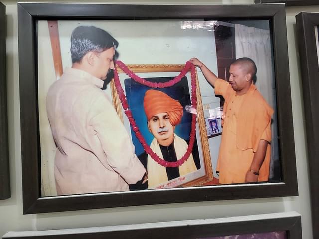 UP Chief Minister Yogi Adityanath garlanding the photo of  Thakur Gurudutt Singh.