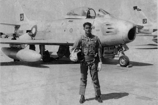 A Pakistan Air Force (PAF) pilot posing in front of a F-86 Sabre jet. (Pakistan Defence)