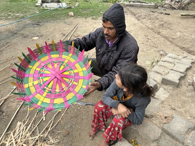 Mangal's cousin shows a hand-crafted 'dal' tray