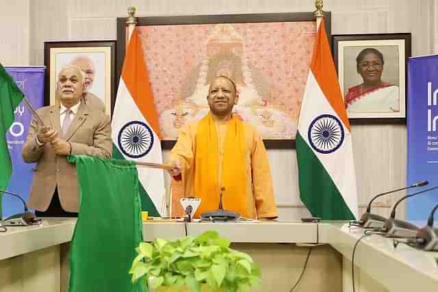 Yogi Adityanath inaugurating Ayodhya-Ahmedabad flight