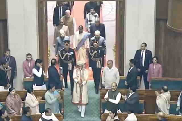 President Droupadi Murmu being led by Sengol