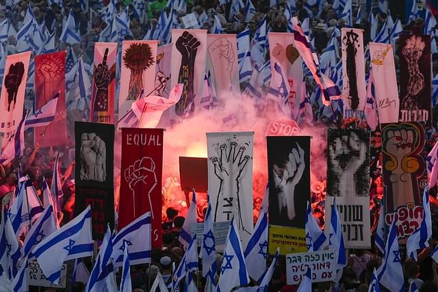 Israelis protested against plans by Prime Minister Benjamin Netanyahu's government to overhaul the judicial system in Jerusalem in September last year. (AP Photo/Ohad Zwigenberg)