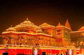 Ayodhya's Ram Mandir lit up in the evening.