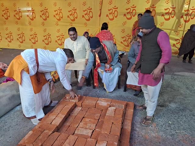 Rameshwar ji and his sahayaks preparing for the havan. 