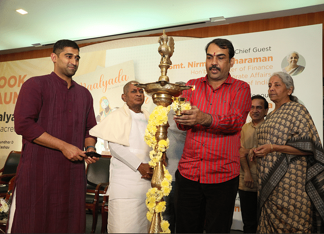 Rangaraj Pandey lighting the lamp at the book launch event.