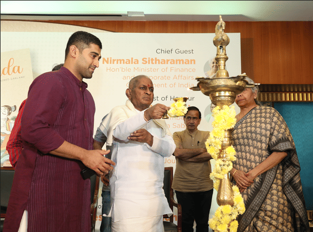 Ilaiyaraaja lighting the lamp at the book launch event.