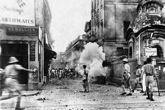 Police in action against Hindus in the 1964 Calcutta riots.