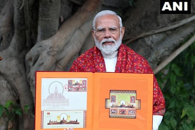PM Narendra Modi releasing commemorative postal stamps dedicated to Ram Janmabhoomi Mandir