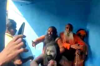 A video grab of sadhus being assaulted in Purulia.