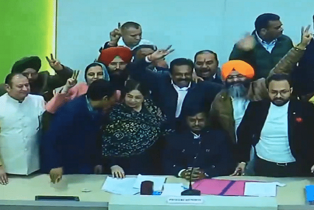 BJP's Manoj Sonkar (seated) won the Chandigarh mayoral elections. (screengrab via ANI)