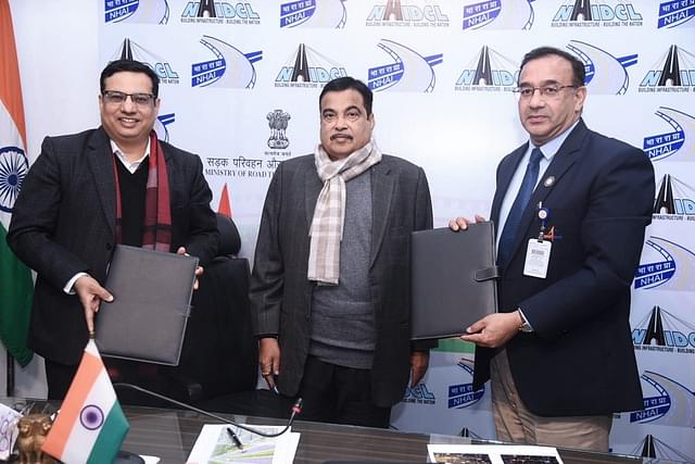 Union Road Transport and Highways Minister Nitin Gadkari with other officials during the MoU signing ceremony.